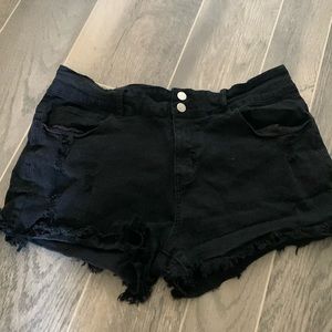Black distressed cut off denim shorts